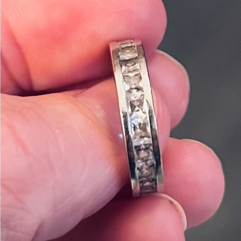 White gold and cubic zirconia channel set band